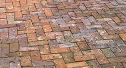 Showing the coloration with an interesting pattern of brick pavers.