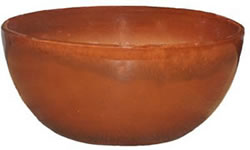 A large reddish brown low bowl